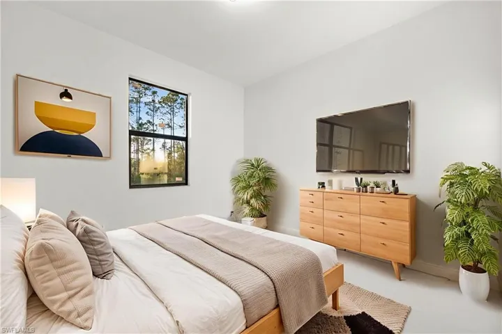 Bedroom with baseboards