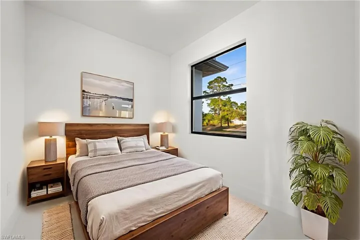 Bedroom featuring baseboards