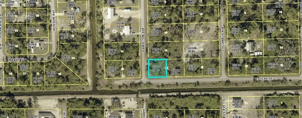 Aerial overview of property's location with property parcel outlined