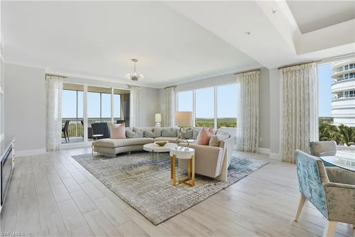 Sophisticated, understated and elegant! Welcome home to your END unit in Bonita Bay's tower of Seaglass.