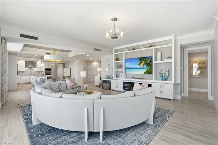 The built-in fireplace and custom shelving are only the beginning. This home boasts MANY upgrades!