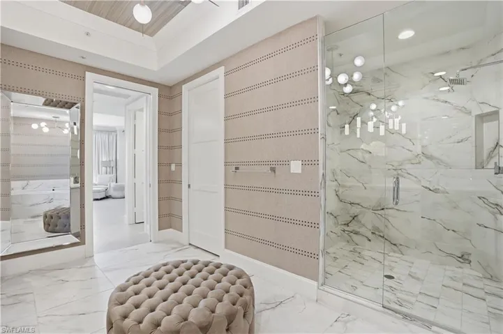 The primary bathroom feels like a luxurious spa!