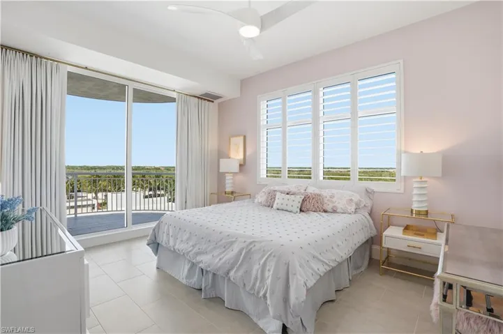 Guest bedroom, privately tucked away with en suite bathroom and balcony overlooking the bay.
