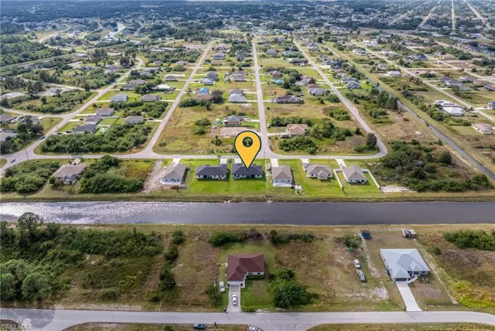 View of property location featuring nearby suburban area
