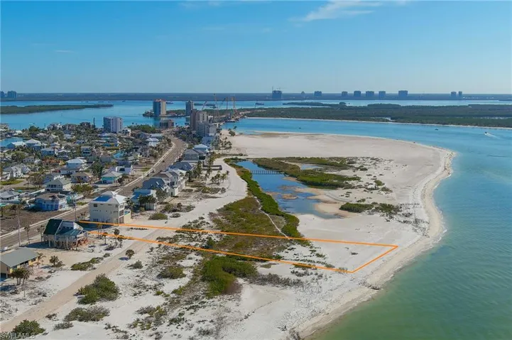 Bird's eye view with a beach view and a water view