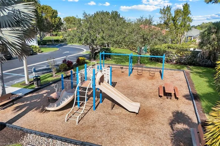 Community jungle gym featuring a yard