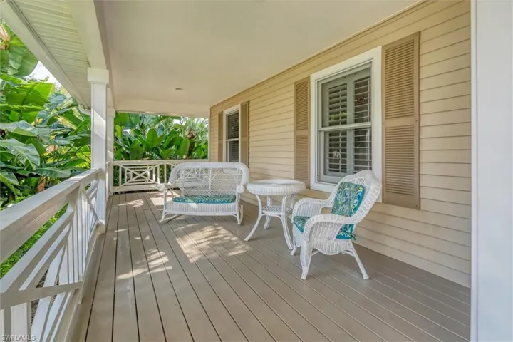 Deck featuring covered porch