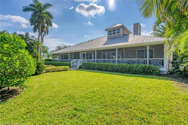 View of the back of property & expansive porch