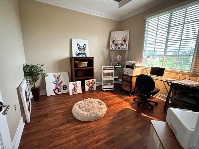Home office with crown molding