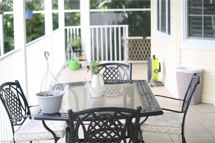 upstairs Balcony with a patio