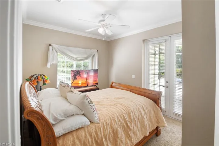 1st floor Bedroom featuring french doors to the Pool area
