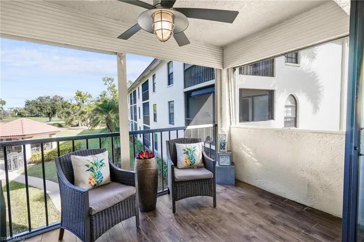 Balcony featuring a ceiling fan