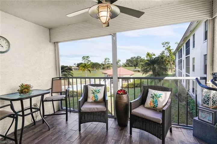 Balcony featuring a ceiling fan