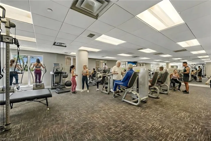 Exercise room with a paneled ceiling