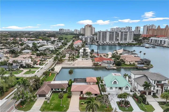 Aerial view of a nearby body of water and city skyline