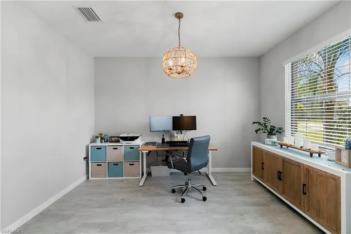 Currently used as an office but could be used as a formal dining space.