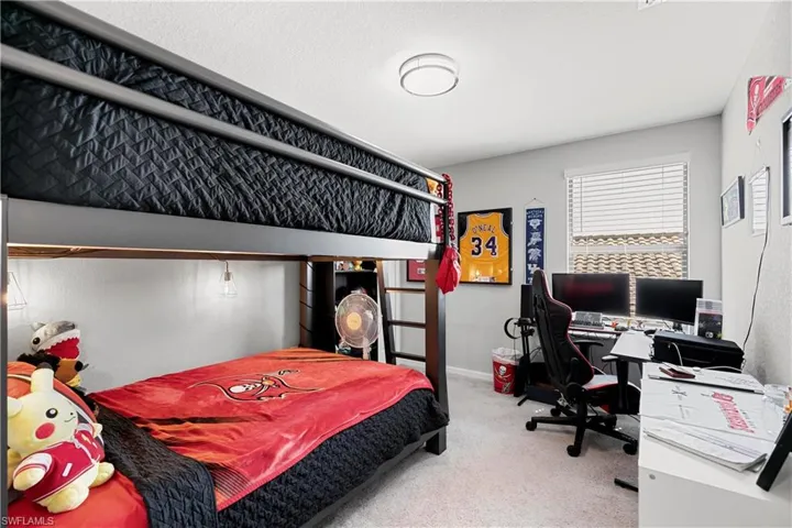 Bedroom wit walk in closet.