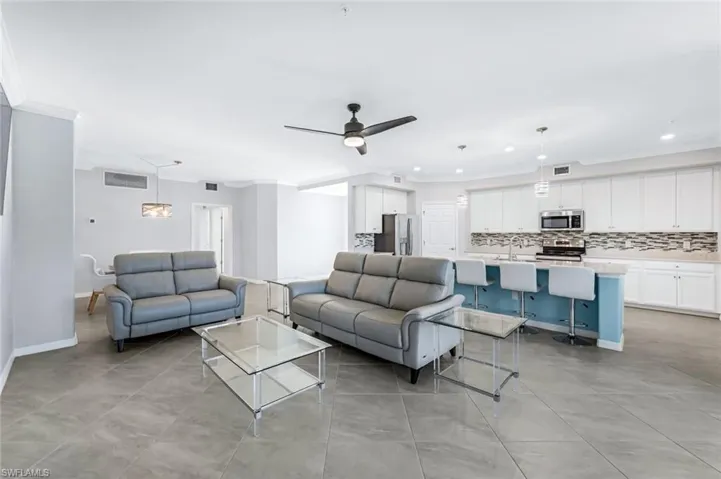 Living, dining, and kitchen are open to one another.