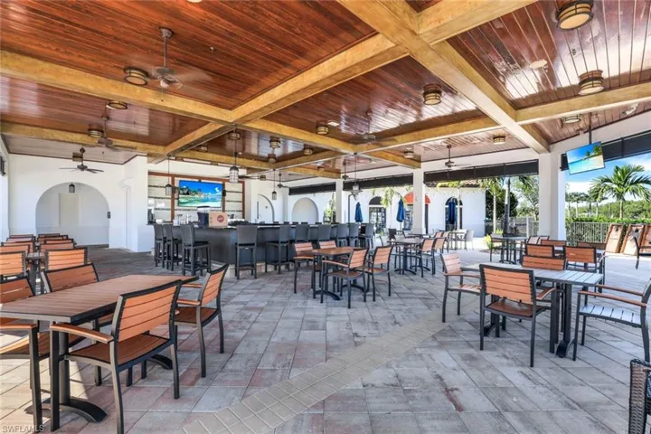 Casual dining area by the pool.