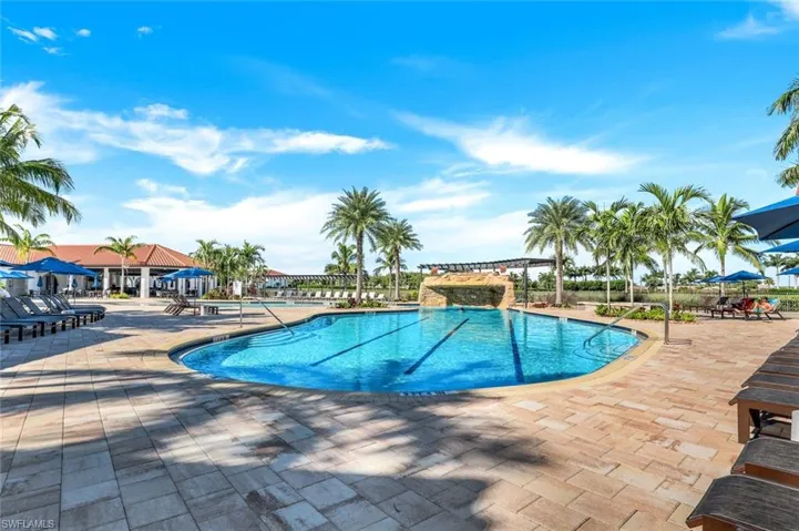 Pool offers stunning water feature.