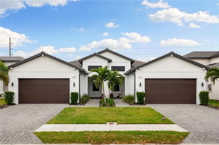 Home is on the left hand side! Lovely paver driveway!