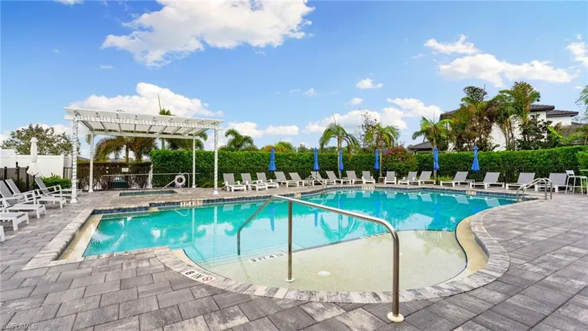 Community Pool and Spa with ample seating and umbrella coverage!