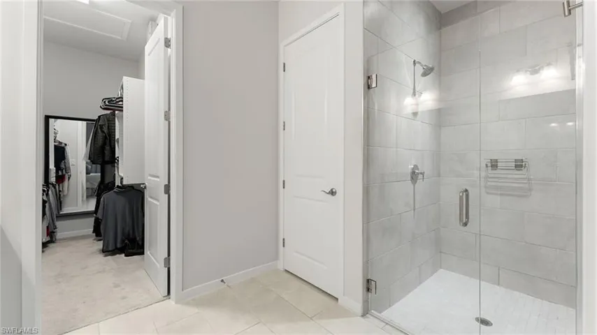 Walk-In Shower and door leading to private water closet!