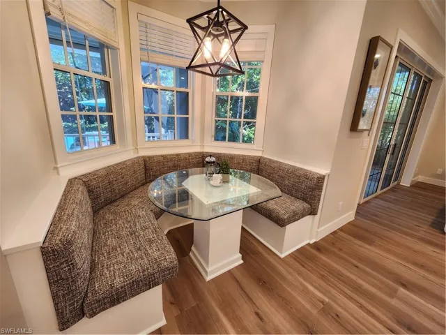 Dining space featuring breakfast area and wood finished floors