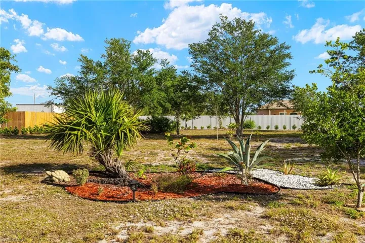 View of yard with fence