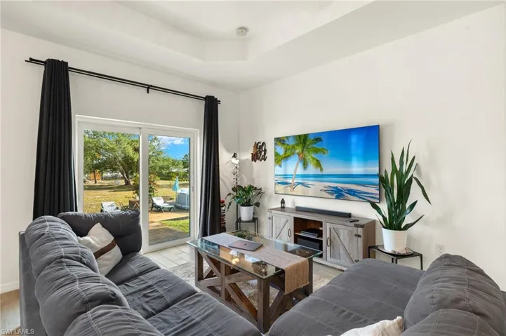 Living room with a raised ceiling