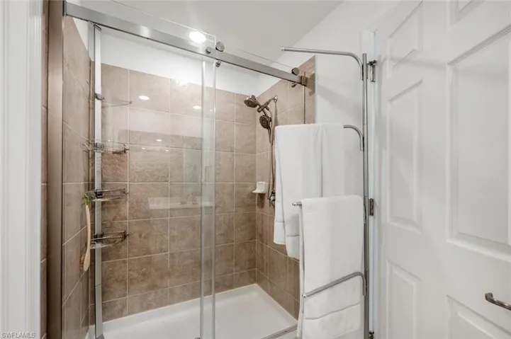 Bathroom featuring a shower stall