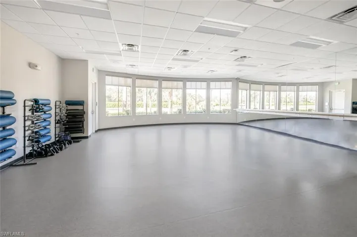 Exercise room with a paneled ceiling