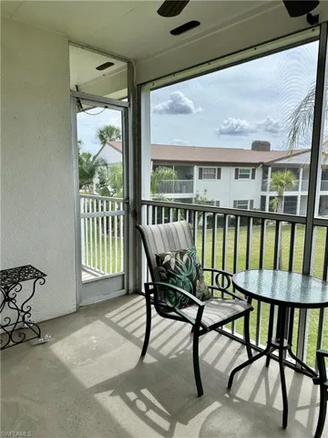 Door to stairs leading to the first floor and to pool