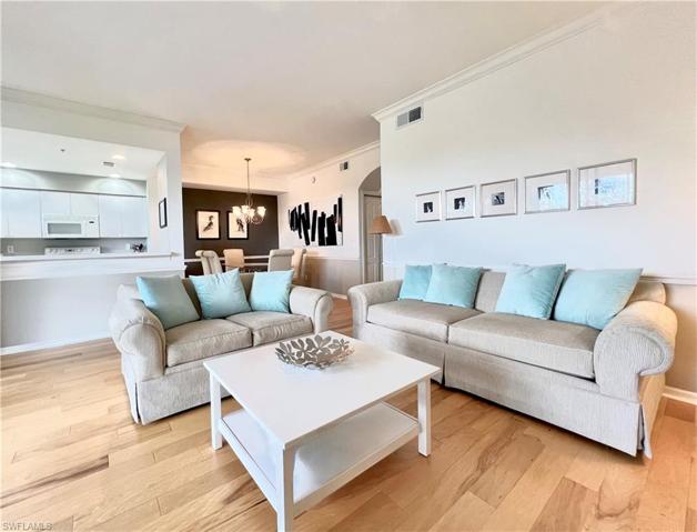 Main living opens to kitchen and dining room