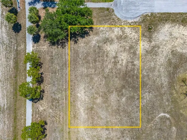 Aerial overview of property's location featuring property boundaries highlighted