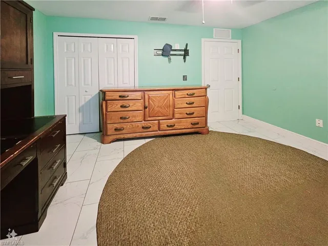 Bedroom featuring a closet
