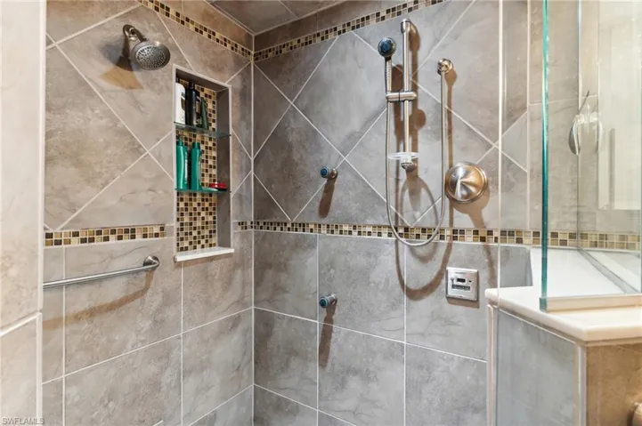 Bathroom with a tile shower