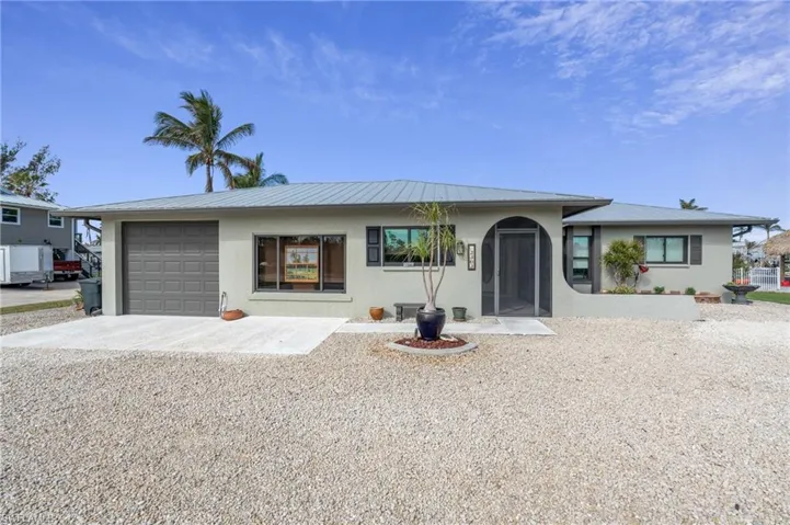 Single story home with a garage