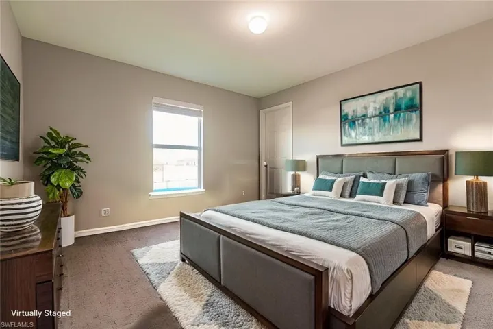 Bedroom with carpet