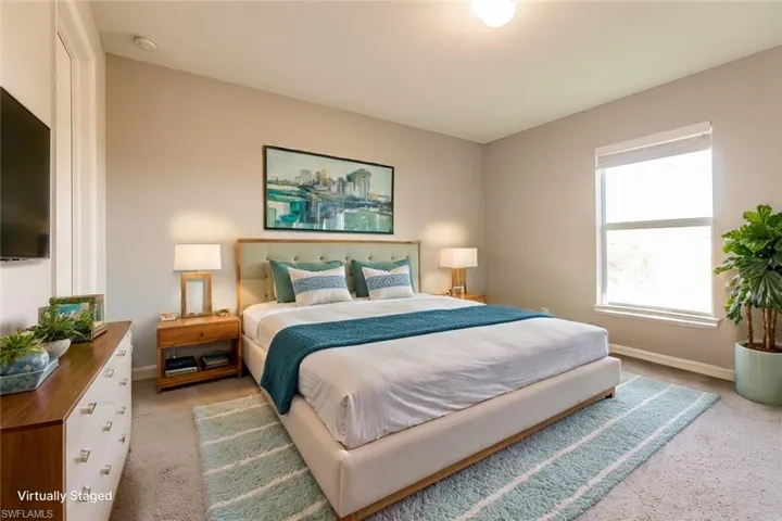 View of carpeted bedroom