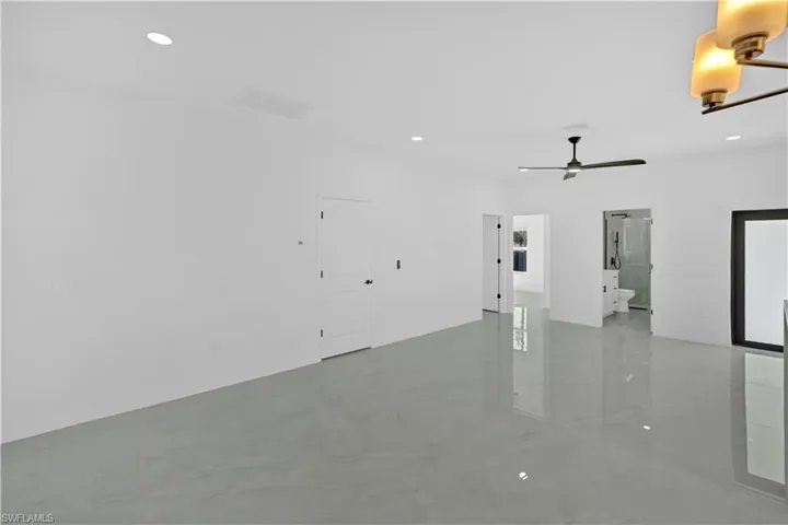 Garage featuring recessed lighting and ceiling fan