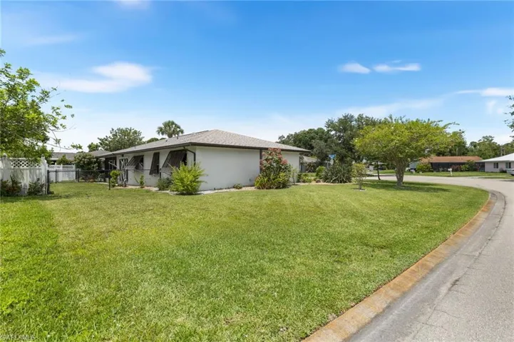 View of property exterior with stucco siding