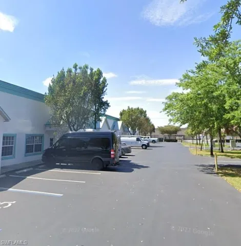 View of uncovered parking lot