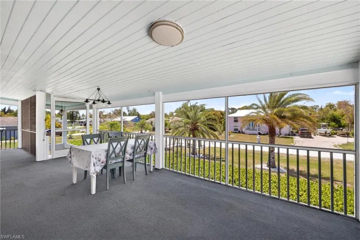 Large, elevated, screened front porch for entertaining or just relaxing