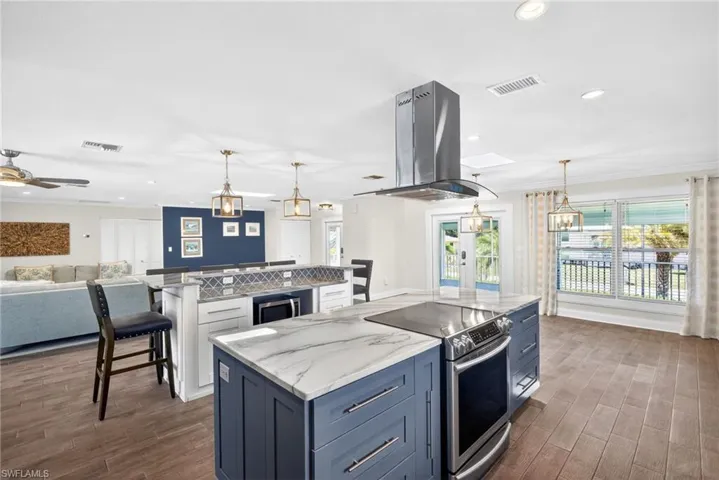 Tons of storage with drawers for pots/pans and tons of natural light from all of the windows