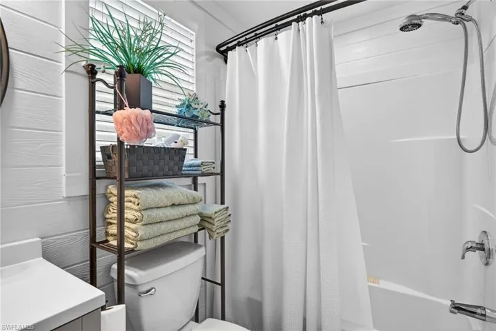 Cottage has a full bathroom with tub/shower combo