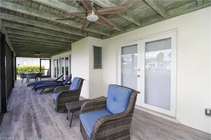 View of patio / terrace with ceiling fan and french doors