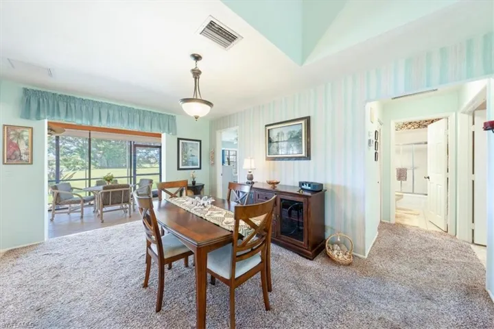 View of carpeted dining room