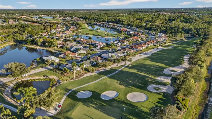 Aerial overview of property's location with nearby suburban area and a large body of water