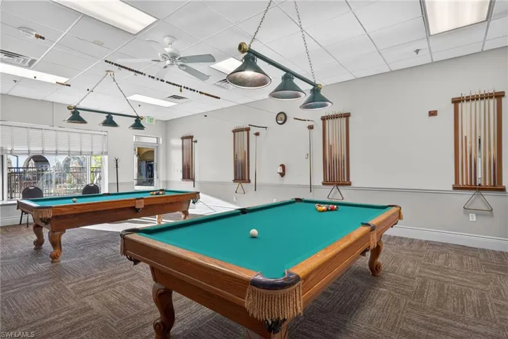 Rec room featuring billiards, a paneled ceiling, and a ceiling fan